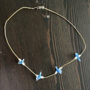 Liquid silver chocker with carved bluebirds